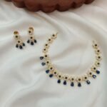 Blue Thilak with Pearl Flower Short Neck Set